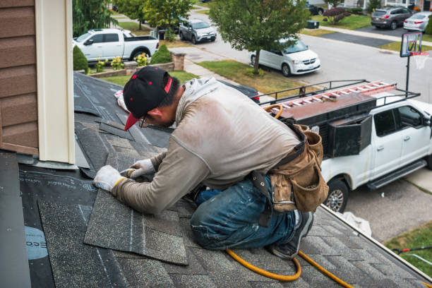 Professional Roofing technician working in Bishopville, MD
